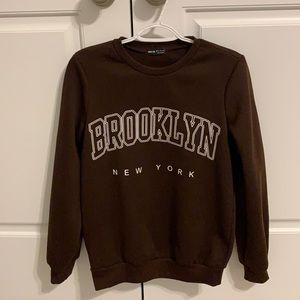 This Brooklyn New York crew neck is a size xs and is brand new (never worn).